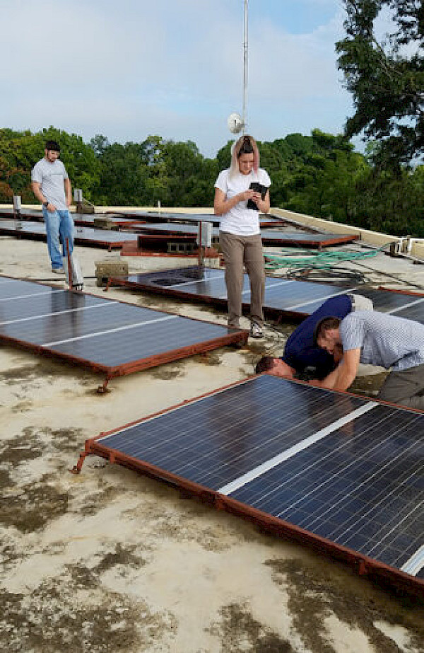 Espe performs a solar inspection with Engineering Ministries International (eMi) in Haiti.